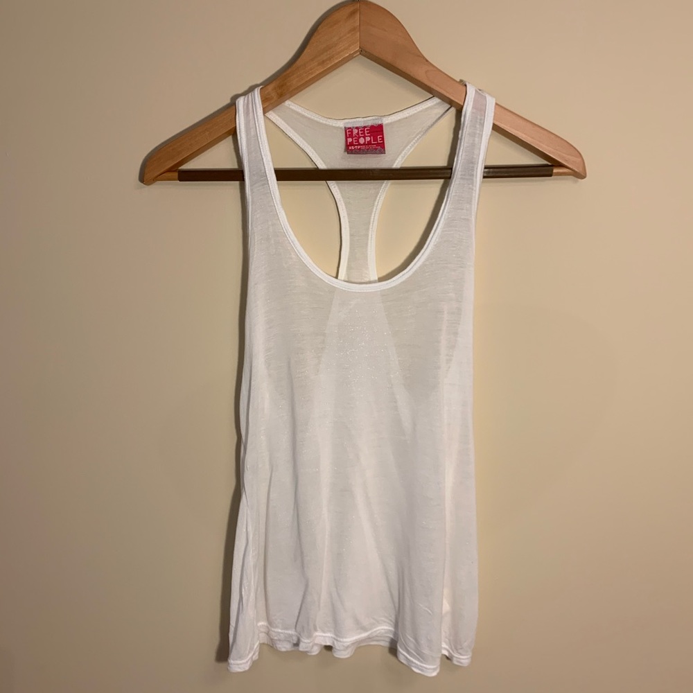 White tank shimmer free people. XS
